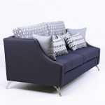 detalle brazo sofa moderno curve patas metalicas tapizado