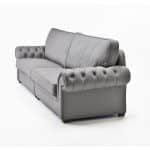 Detalle tapizado capitone brazo sofa marino salon clasico piel
