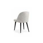 Silla ARTÉS con patas metálicas cónicas y tapizado premium para espacios modernos.