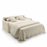 Sofá cama RISE con apertura italiana, colchón de 200 cm y tejidos personalizables para un descanso diario.